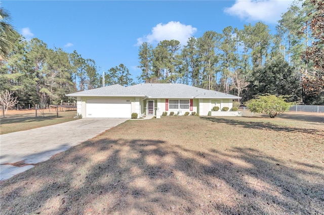 single story home featuring a front yard and a garage