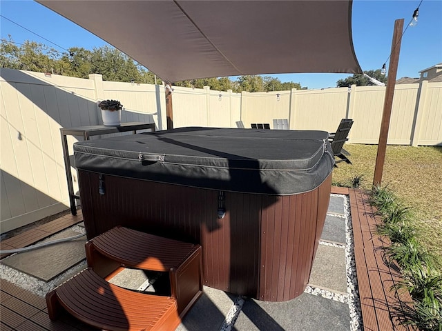 view of patio featuring a hot tub