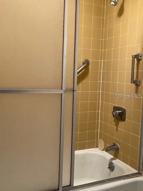 bathroom featuring tiled shower / bath combo