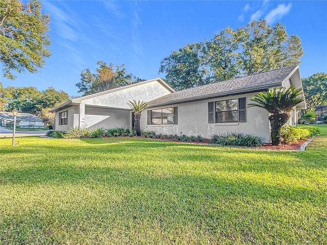 ranch-style house with a front lawn