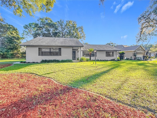 ranch-style house with a front yard