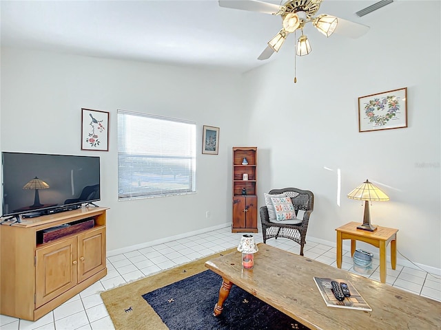 interior space featuring light tile patterned floors and ceiling fan