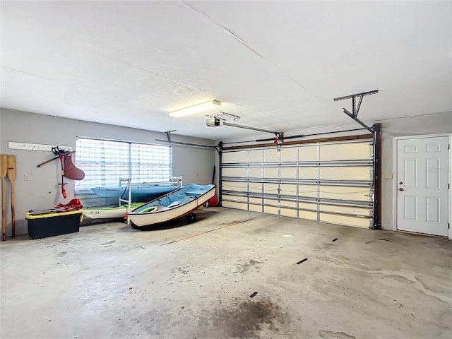 garage featuring a garage door opener