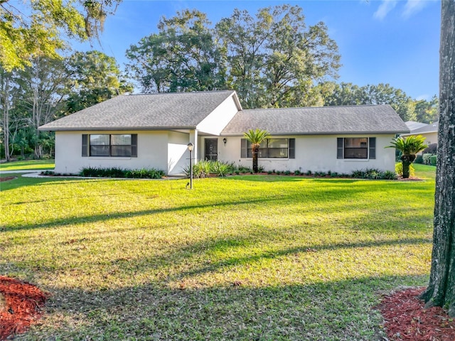 single story home with a front yard