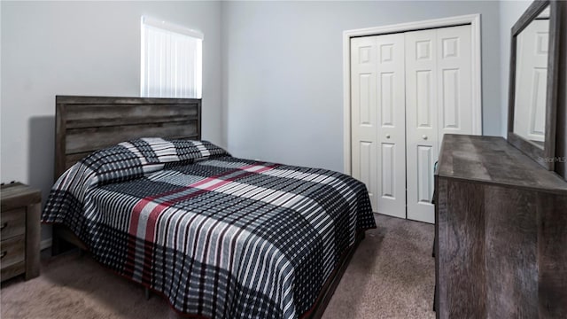 carpeted bedroom featuring a closet