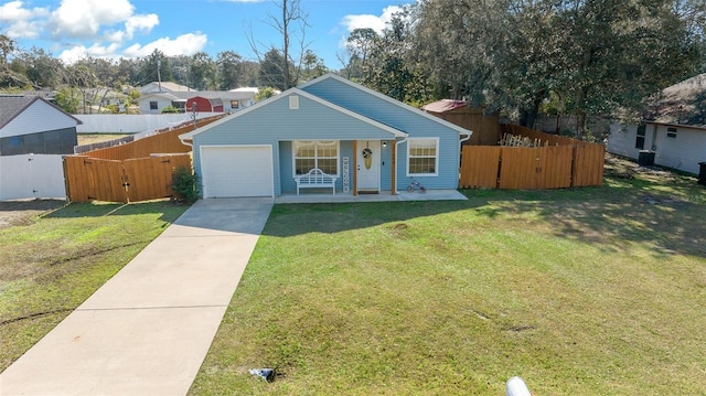 view of front of property with a front yard, a porch, and a garage