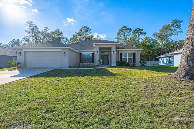 view of front of house featuring a front lawn and a garage