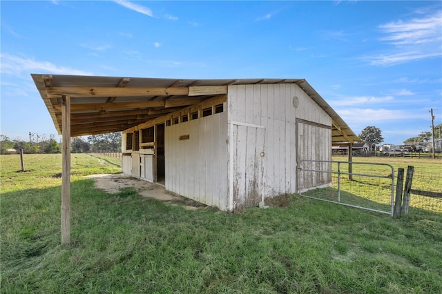 view of outdoor structure featuring a rural view