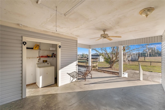 view of patio with ceiling fan and washer / clothes dryer