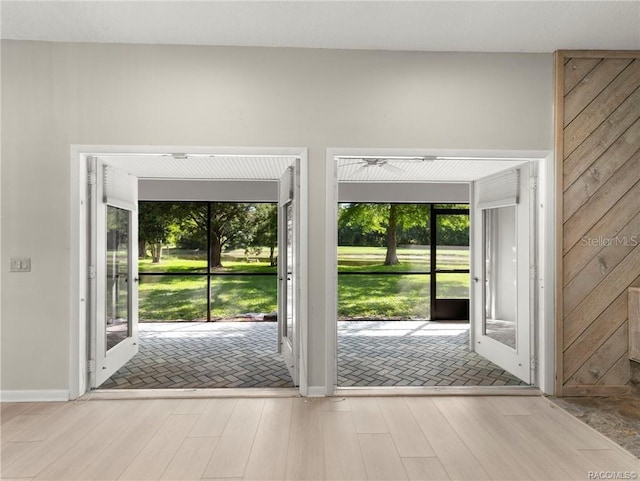 doorway to outside with light hardwood / wood-style flooring