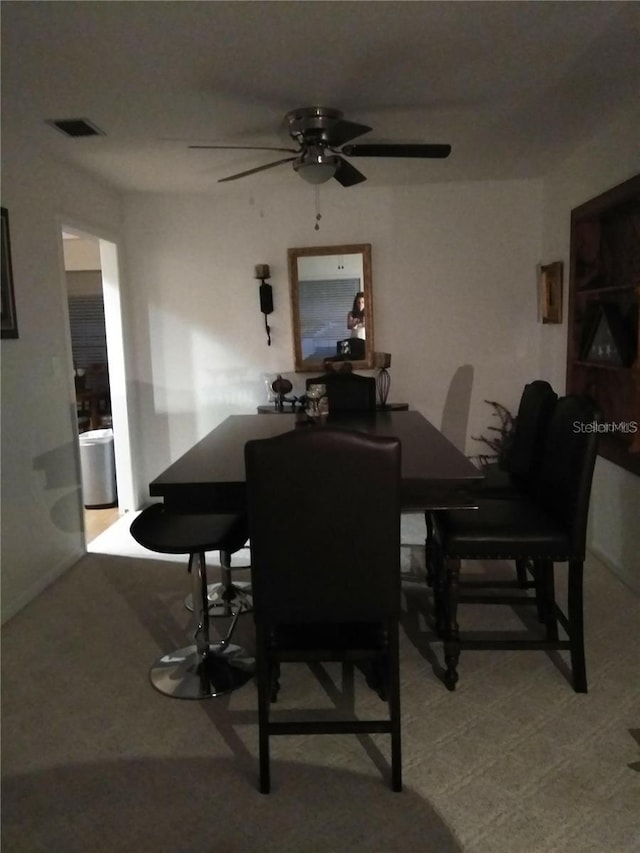 dining room with ceiling fan