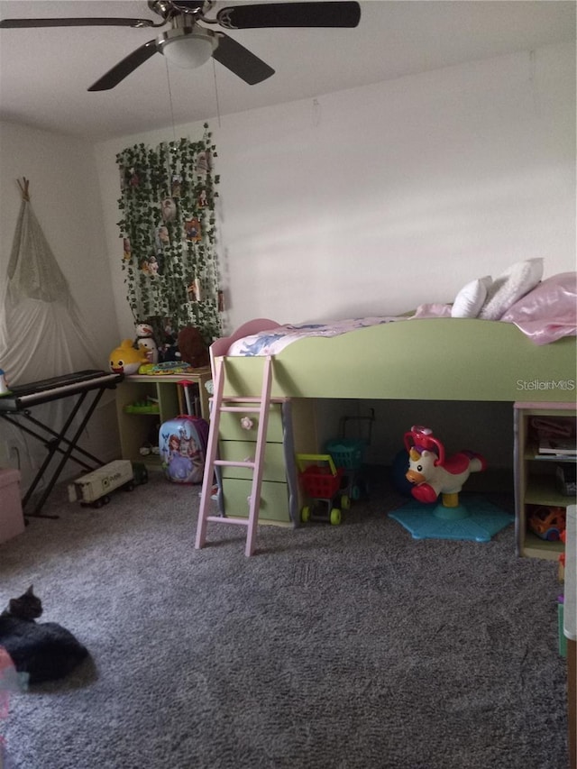 carpeted bedroom featuring ceiling fan