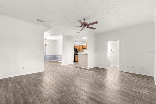 unfurnished living room featuring a textured ceiling, crown molding, and ceiling fan with notable chandelier