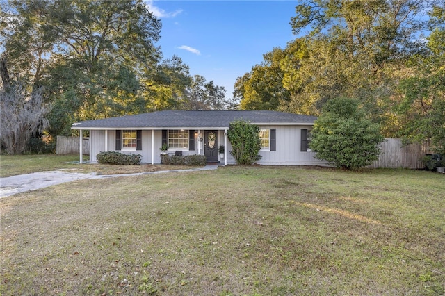 ranch-style home with a front yard