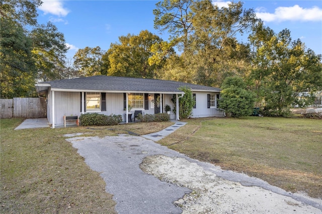 ranch-style house with a front lawn