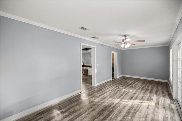 spare room with hardwood / wood-style floors, ceiling fan, and ornamental molding