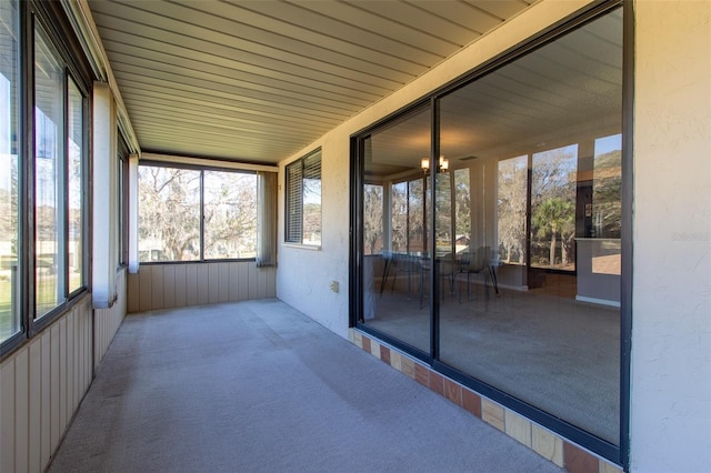 unfurnished sunroom featuring plenty of natural light