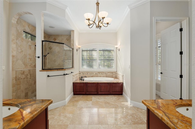 bathroom featuring vanity, a notable chandelier, independent shower and bath, and ornamental molding