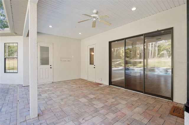 view of patio with ceiling fan