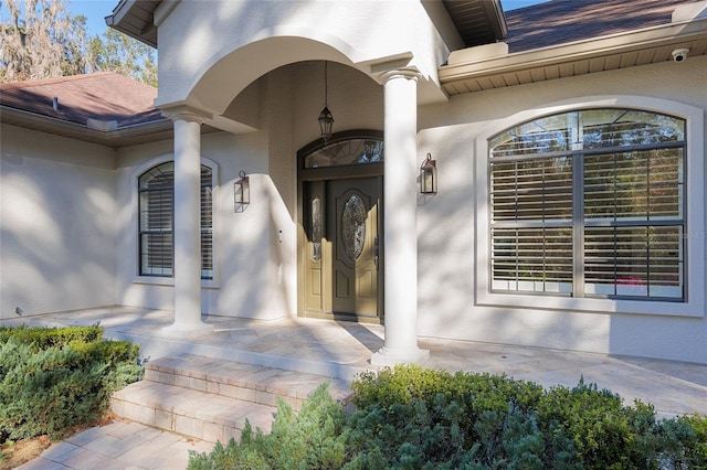 entrance to property with a porch