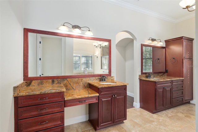 bathroom with vanity and ornamental molding