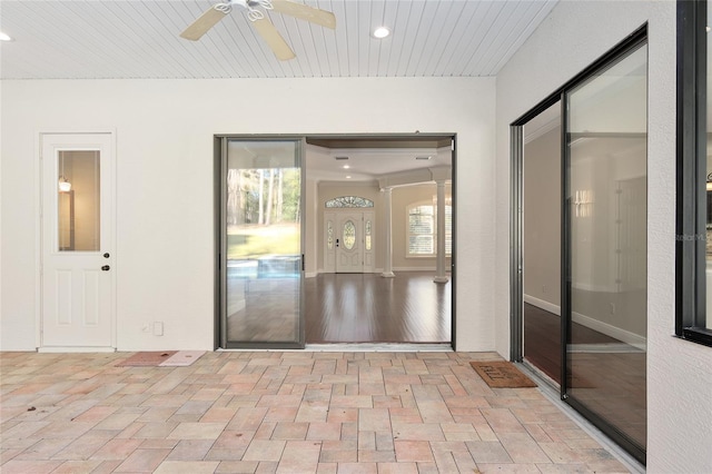 interior space featuring ceiling fan