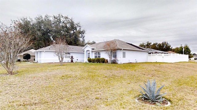 view of front of house with a front lawn