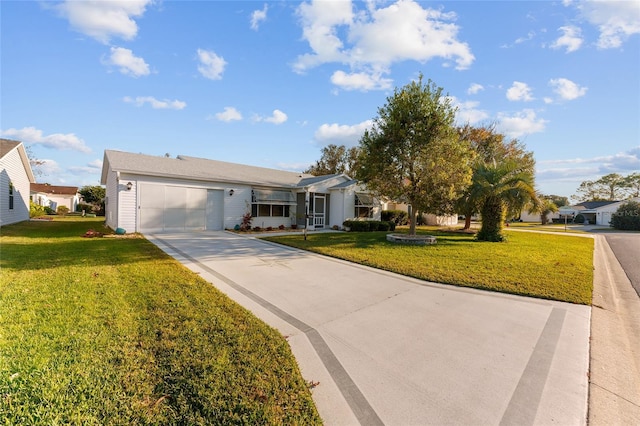 ranch-style house with a garage and a front lawn