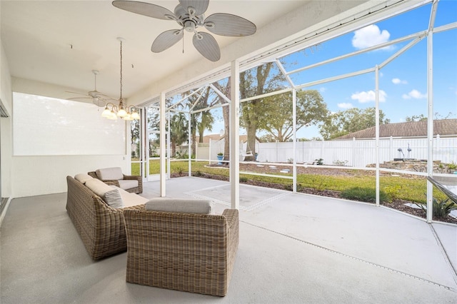 sunroom / solarium with ceiling fan