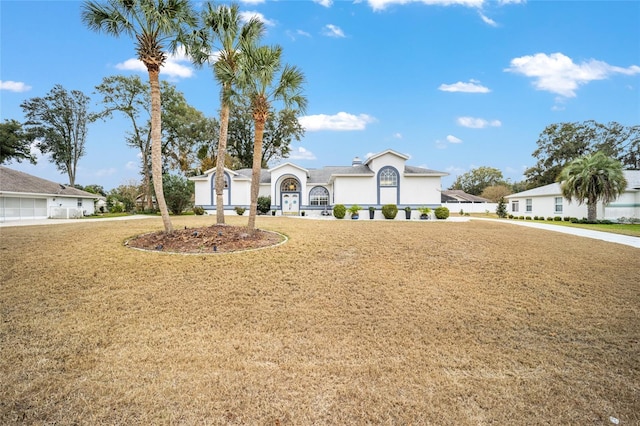 view of front of house with a front lawn