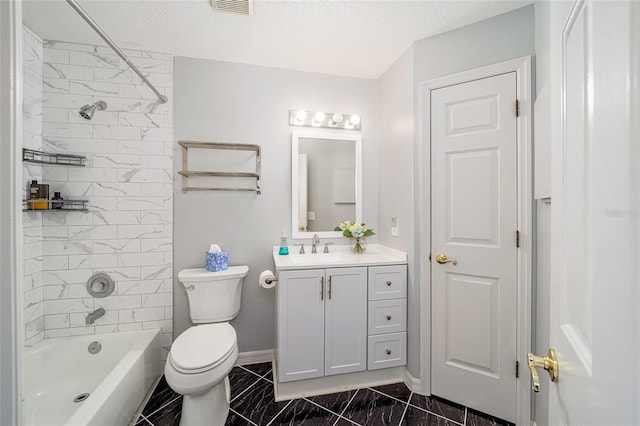 bathroom with tub / shower combination, vanity, toilet, marble finish floor, and baseboards