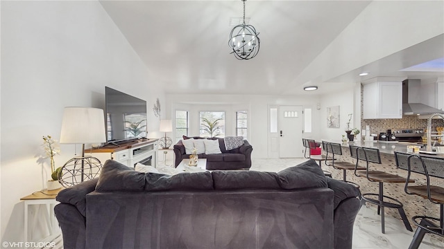 living room featuring an inviting chandelier