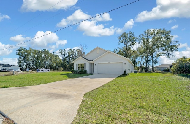 ranch-style home featuring a front yard and a garage