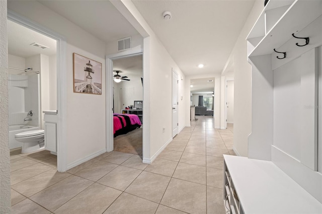 interior space with light tile patterned floors