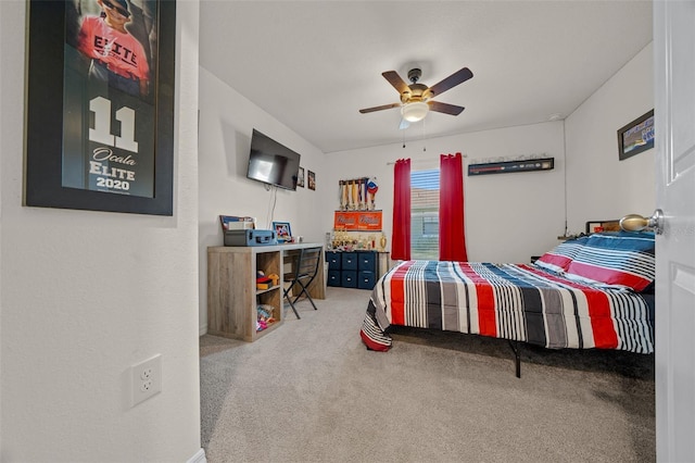 bedroom featuring ceiling fan and carpet floors