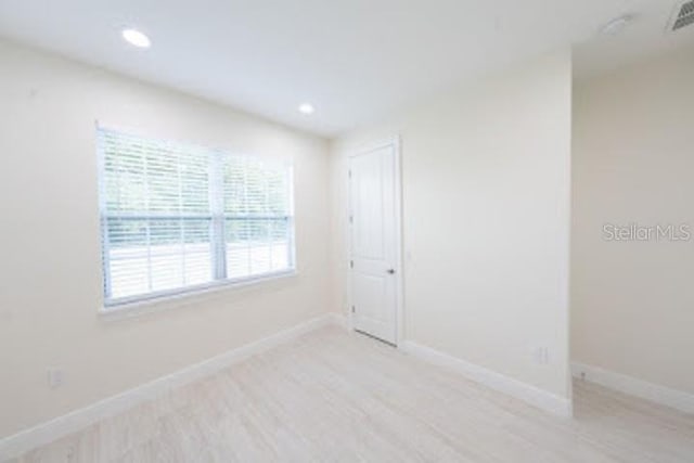 empty room featuring light wood-type flooring