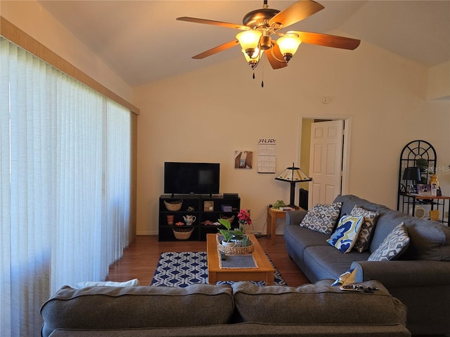 living room with hardwood / wood-style flooring, vaulted ceiling, and ceiling fan