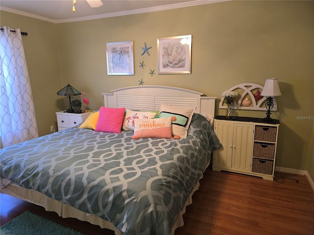 bedroom with ceiling fan, dark hardwood / wood-style floors, and ornamental molding