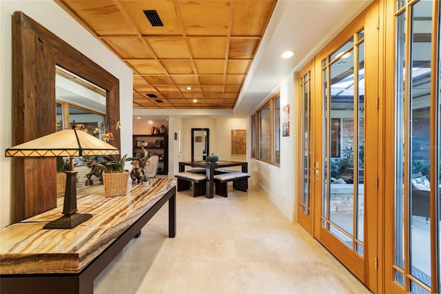 hallway with wooden ceiling and french doors