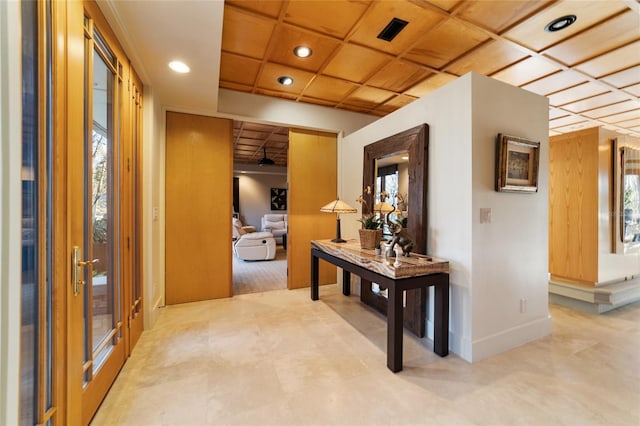 hallway featuring coffered ceiling