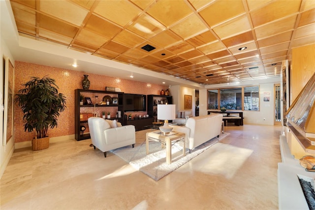 living room featuring coffered ceiling