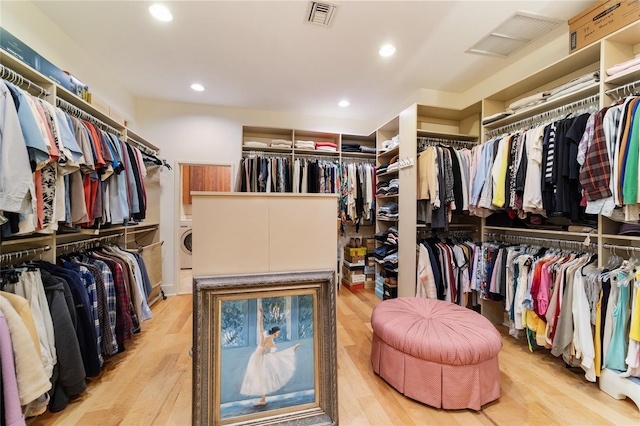 spacious closet with light wood-type flooring