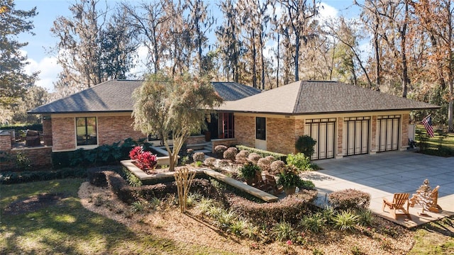 single story home featuring a patio