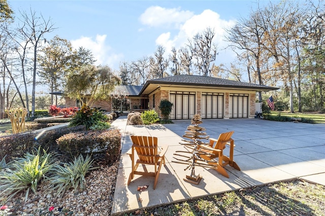 view of patio with a garage