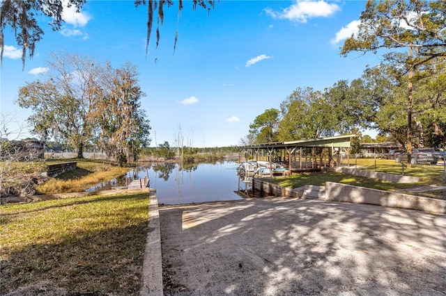 dock area with a water view