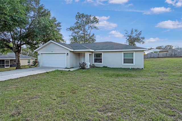 ranch-style house with a garage and a front yard