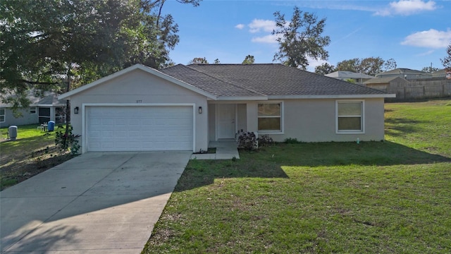 ranch-style home with a front lawn and a garage