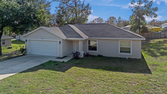 ranch-style house with a garage and a front lawn