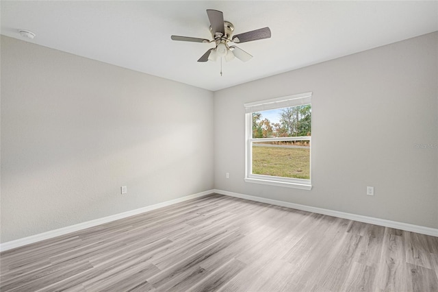 unfurnished room featuring ceiling fan and light hardwood / wood-style floors