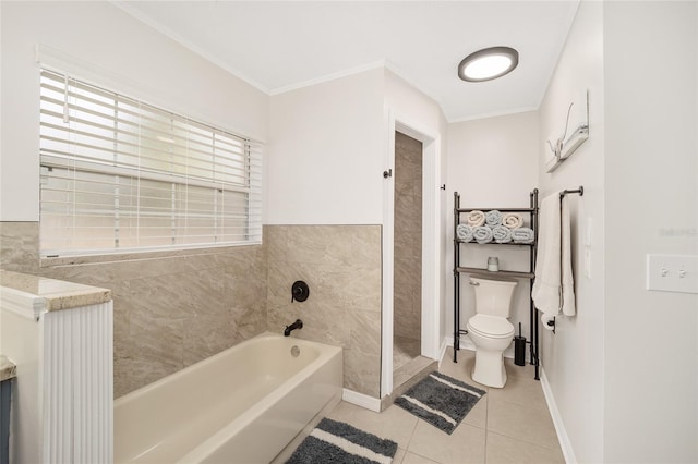 bathroom featuring a bathtub, crown molding, tile patterned floors, and toilet